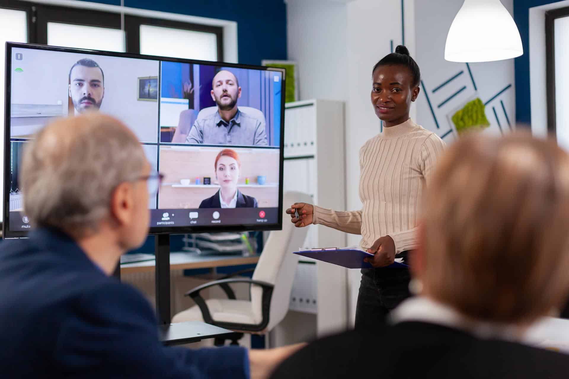 Wireless Presentation system - woman presenting in boardroom